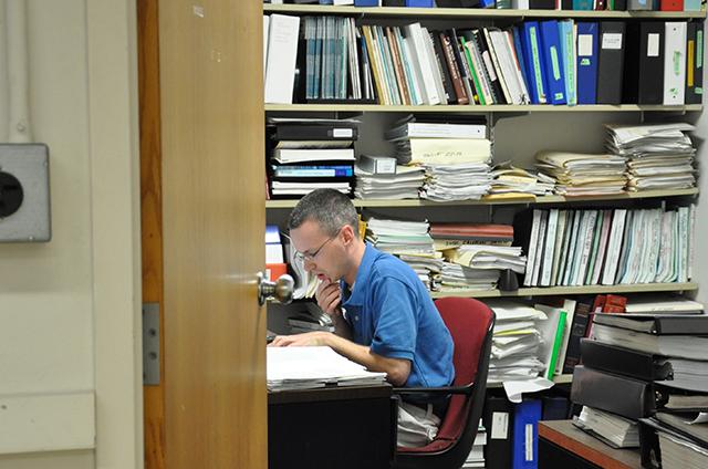 student working on a paper